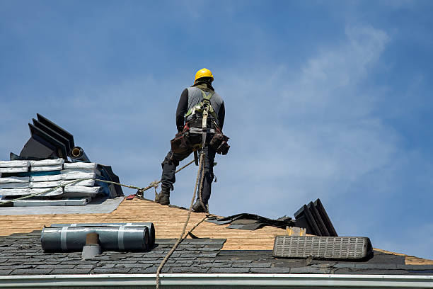 Professional Roofing technician working in Fairfax, VT